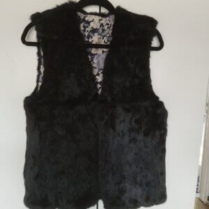 black faux fur vest